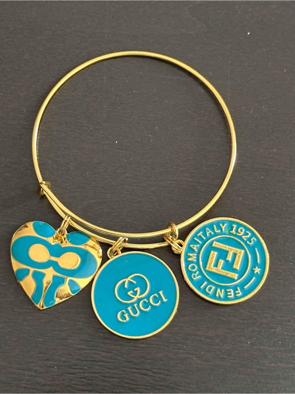Gold-Tone Bracelet with Teal Enamel Logo, Heart & Coin Charms